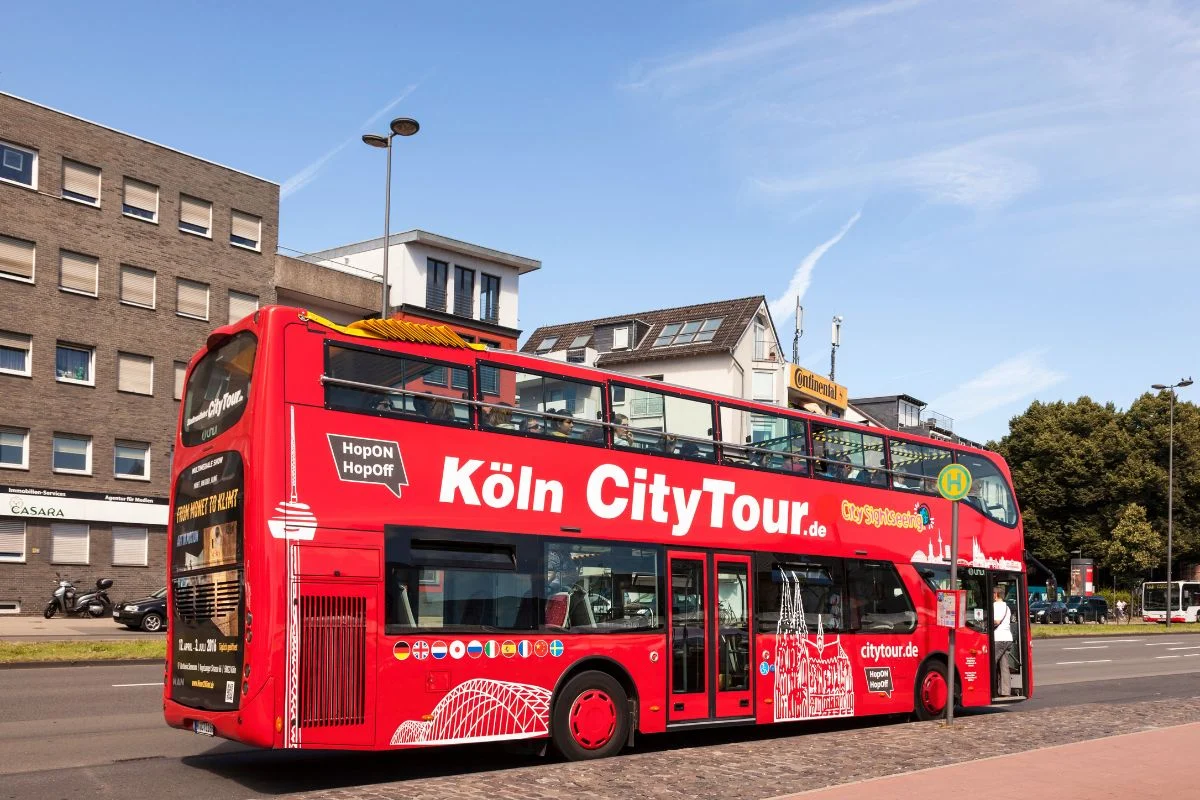 Roll through Cologne on a bus tour